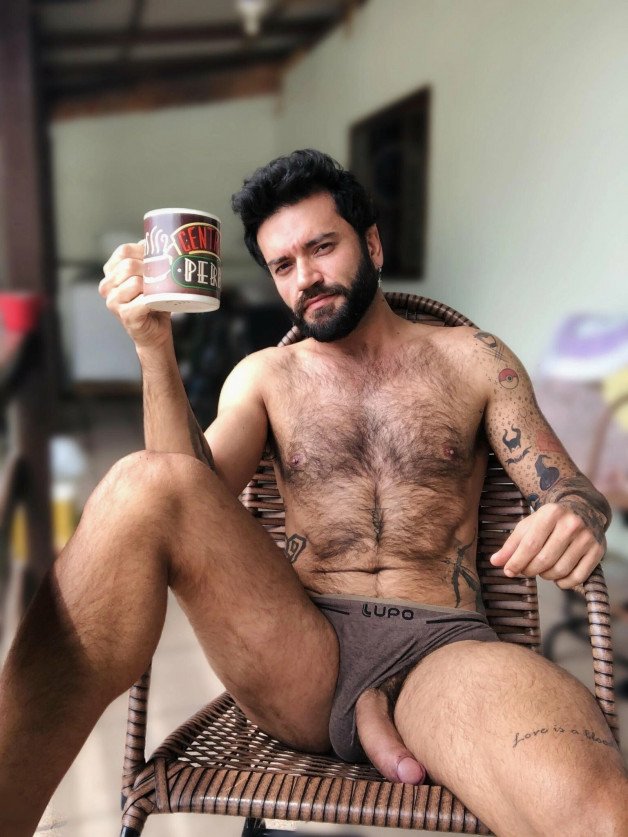 Photo by Nickplus33 with the username @Nickplus33, who is a verified user,  September 10, 2023 at 3:42 AM and the text says '#dilf #coffee #hairy #reveal #hung #schlong  #massivecock #uncut'