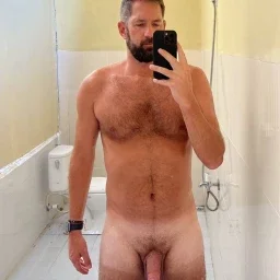 Photo by Nickplus33 with the username @Nickplus33, who is a verified user,  April 7, 2024 at 3:31 AM and the text says '#selfie #hairy #shower #beard #dilf #trimmed'