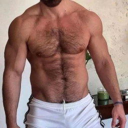 Photo by Nickplus33 with the username @Nickplus33, who is a verified user,  May 6, 2024 at 4:40 AM and the text says '#toned #muscled #hairy #hairychest #dilf #beard'