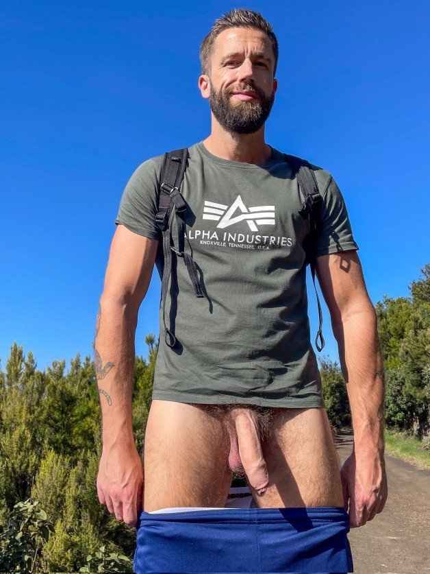 Photo by Nickplus33 with the username @Nickplus33, who is a verified user,  April 21, 2024 at 3:42 AM and the text says '#dilf #outdoors #hung #longdick #bush #uncut  #foreskin #beard'