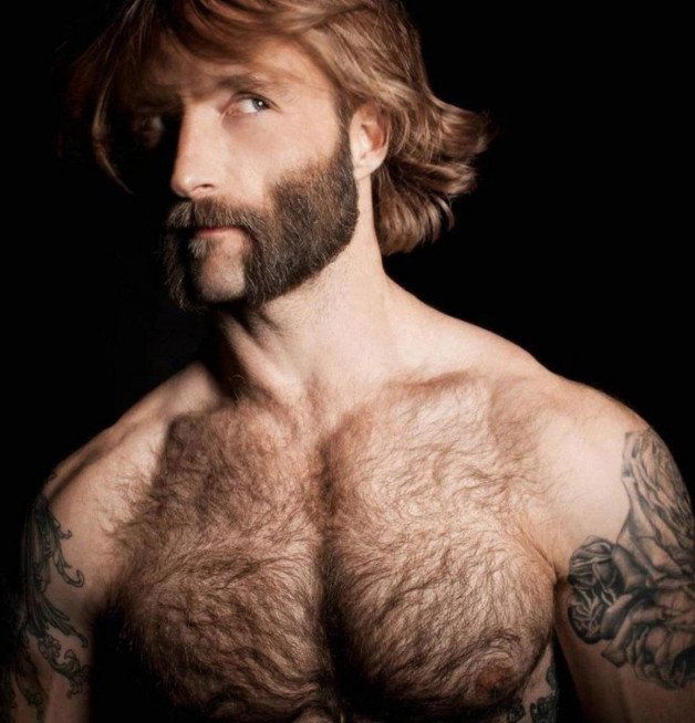 Photo by Nickplus33 with the username @Nickplus33, who is a verified user,  April 19, 2024 at 1:44 AM and the text says '#nicolasryder #obsession #hairy #dilf #beard #stache #hairychest #youngdilf'