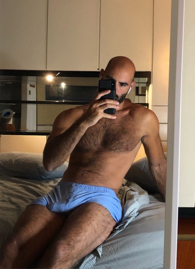 Photo by Nickplus33 with the username @Nickplus33, who is a verified user,  February 10, 2024 at 4:03 AM and the text says '#selfie #dilf #bald #hairy #toned #bulge'