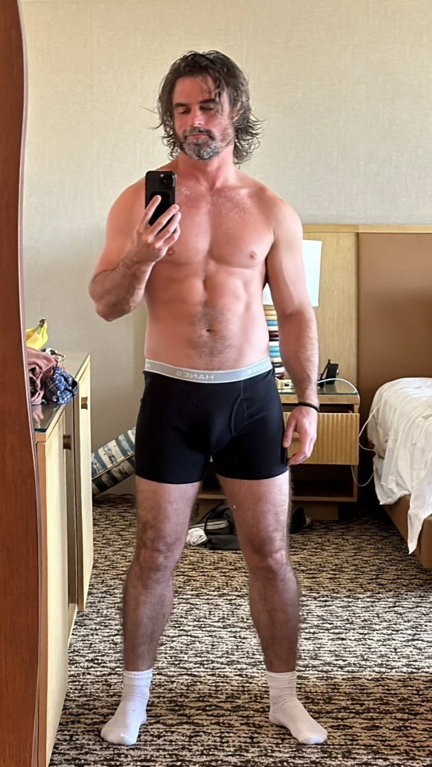 Photo by Nickplus33 with the username @Nickplus33, who is a verified user,  April 15, 2024 at 1:35 AM and the text says '#selfie #daniellebang #andycatlin #toned #beard #obsession #dilf'