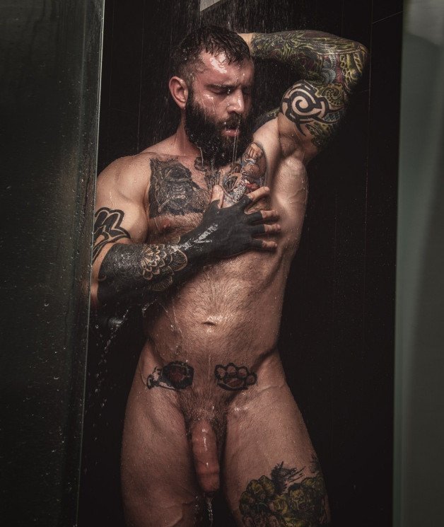Photo by Nickplus33 with the username @Nickplus33, who is a verified user,  April 30, 2024 at 1:16 AM and the text says '#shower #hairy #dilf #beard #hung #trimmed  #ink #hairychest'