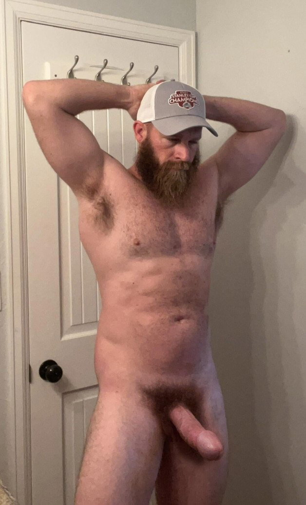 Photo by Nickplus33 with the username @Nickplus33, who is a verified user,  February 18, 2024 at 4:36 AM and the text says '#caps #dilf #beard #ginger #hung #bush #thickdick #massivecock #thickbush  #redneck'