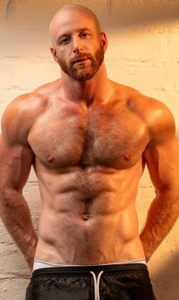 Photo by Nickplus33 with the username @Nickplus33, who is a verified user,  June 25, 2024 at 2:18 AM and the text says '#bald #dilf #hairy #beard #ginger #muscled #toned #hairychest'