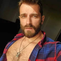 Photo by Nickplus33 with the username @Nickplus33, who is a verified user,  May 3, 2024 at 3:15 AM and the text says '#beard #dilf #hairy #chain #youngdilf #hairychest'