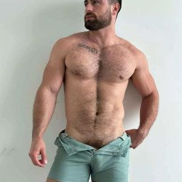 Photo by Nickplus33 with the username @Nickplus33, who is a verified user,  April 25, 2024 at 2:29 AM and the text says '#ruggeryvaldivia #obsession #hairy #beard #toned #trimmed  #bulge #bush #happytrail #youngdilf'