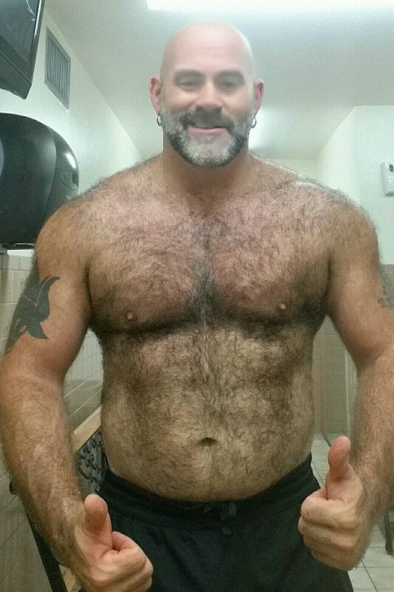 Photo by Nickplus33 with the username @Nickplus33, who is a verified user,  April 21, 2024 at 3:56 AM and the text says '#beefy #daddy #hairy #bald #beard'