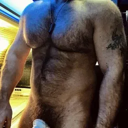 Photo by Nickplus33 with the username @Nickplus33, who is a verified user,  March 22, 2024 at 2:54 AM and the text says '#beard #hairy #beefy #toned #thickbush #chain'