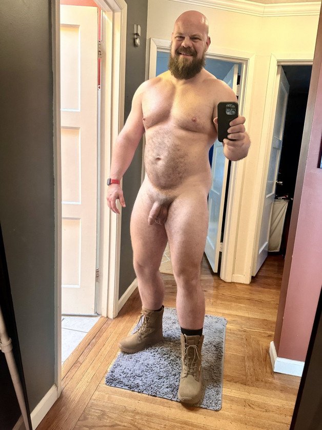 Photo by Nickplus33 with the username @Nickplus33, who is a verified user,  July 13, 2024 at 2:15 AM and the text says '#bald #beard #selfie #hung #bush'