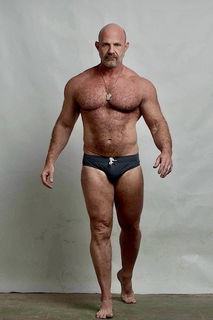 Photo by Nickplus33 with the username @Nickplus33, who is a verified user,  July 10, 2024 at 2:30 AM and the text says '#hairy #muscled #bald #chain #daddy #band #beard'