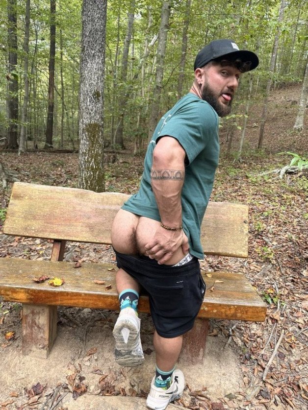 Photo by Nickplus33 with the username @Nickplus33, who is a verified user,  December 11, 2023 at 2:49 AM and the text says '#otter #beard #caps #cruisingoutdoors #outdoorcruising #buttspread #hairyhole'