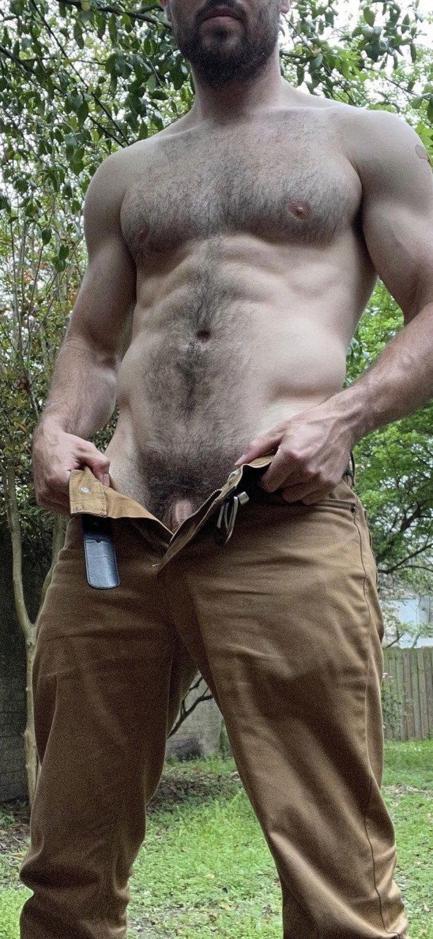 Photo by Nickplus33 with the username @Nickplus33, who is a verified user,  June 1, 2024 at 3:57 AM and the text says '#outdoorcruising #outdoors #hairy #hairychest #toned #thickbush #dilf #scruff'