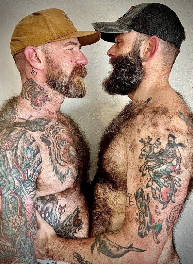 Photo by Nickplus33 with the username @Nickplus33, who is a verified user,  July 8, 2024 at 3:30 AM and the text says '#JackDixon #beard #caps #bear #beard #hairy #daddy #dilf #ink #bromance'