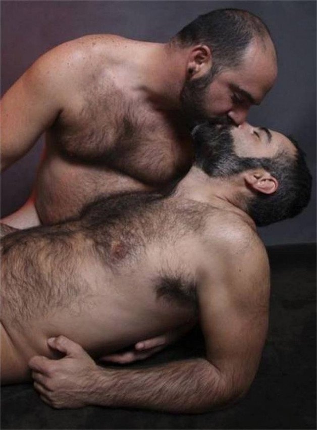 Photo by Nickplus33 with the username @Nickplus33, who is a verified user,  April 27, 2024 at 2:07 AM and the text says '#bromance #beard #hairy #daddy #beefy #bear #kissing'