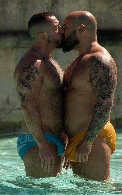 Photo by Nickplus33 with the username @Nickplus33, who is a verified user,  July 12, 2024 at 2:35 AM and the text says '#bromance #outdoors #bear #beefy #daddy #hairy #kissing'