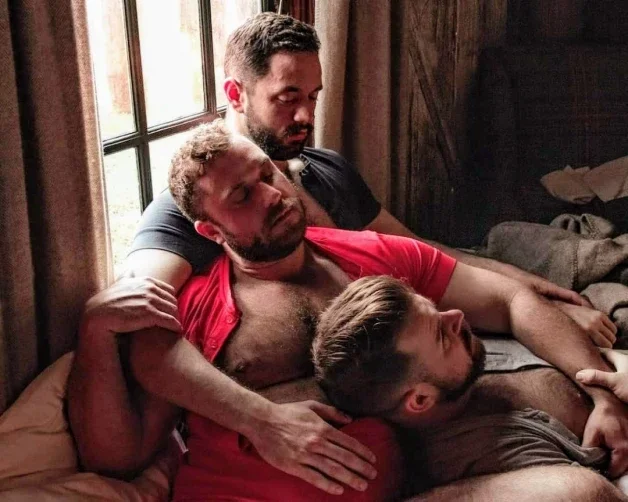 Photo by Nickplus33 with the username @Nickplus33, who is a verified user,  March 16, 2024 at 4:27 AM and the text says '#bromance #hairy #beard #bear #dilf #threesome'