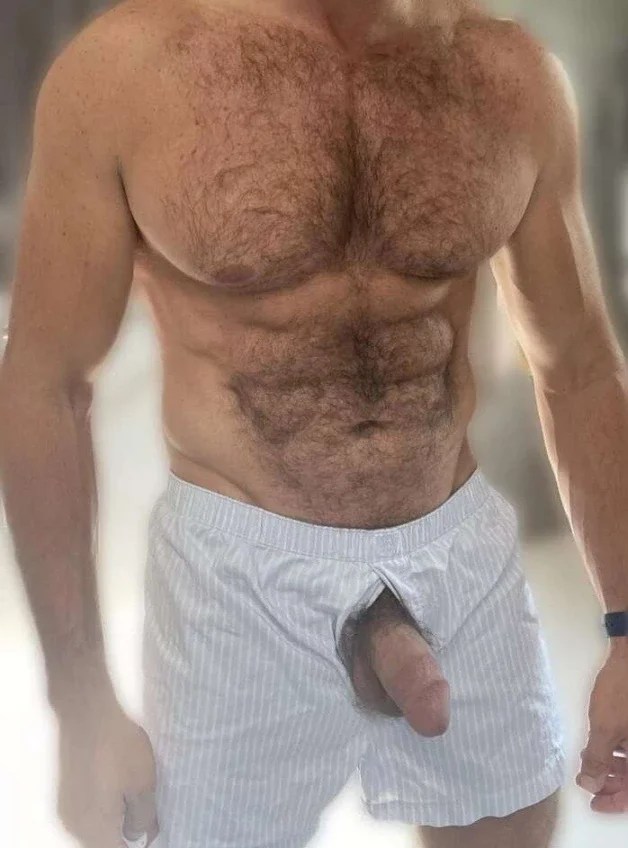 Photo by Nickplus33 with the username @Nickplus33, who is a verified user,  May 2, 2024 at 3:15 AM and the text says '#hairy #reveal #daddy #dilf #toned #thickdick #bush #hung #fatcock'