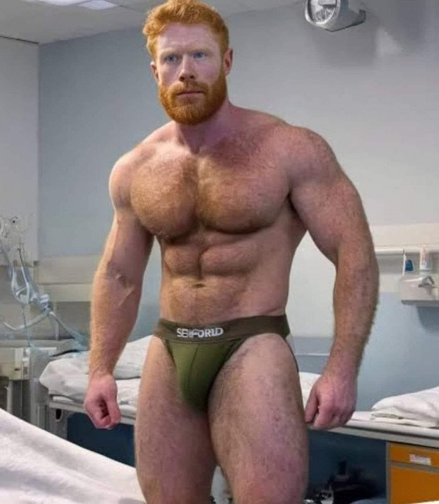 Photo by Nickplus33 with the username @Nickplus33, who is a verified user,  May 30, 2024 at 2:32 AM and the text says '#muscled #ginger #hairy #bulge #dilf #beard #daddy #jockstrap'