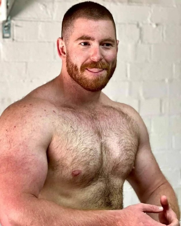 Photo by Nickplus33 with the username @Nickplus33, who is a verified user,  July 14, 2024 at 3:40 AM and the text says '#beefy #bear #hairy #ginger #tongue'