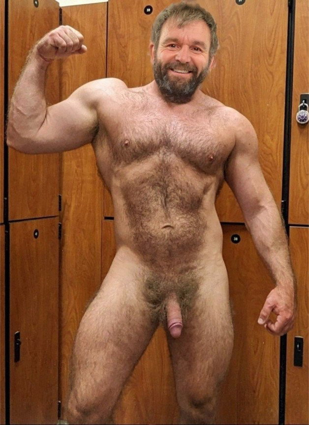 Photo by Nickplus33 with the username @Nickplus33, who is a verified user,  June 5, 2024 at 2:14 AM and the text says '#daddy #lockerroom #toned #hairy #thickbush #bush #bear'