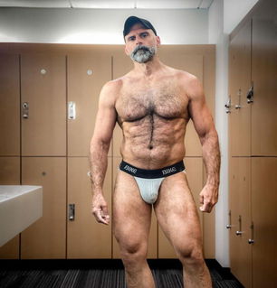 Photo by Nickplus33 with the username @Nickplus33, who is a verified user,  May 10, 2024 at 3:50 AM and the text says '#toned #daddy #hairy #briefs #caps #lockerroom #hairychest #bulge'