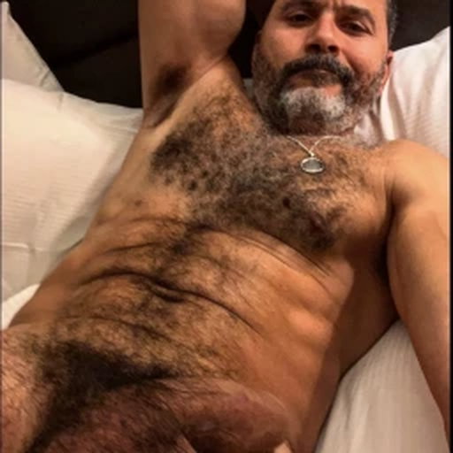 Photo by Nickplus33 with the username @Nickplus33, who is a verified user,  May 5, 2024 at 3:00 AM and the text says '#daddy #hairy #hung #thickdick #beard #chain #toned #tanned #bush #chain'