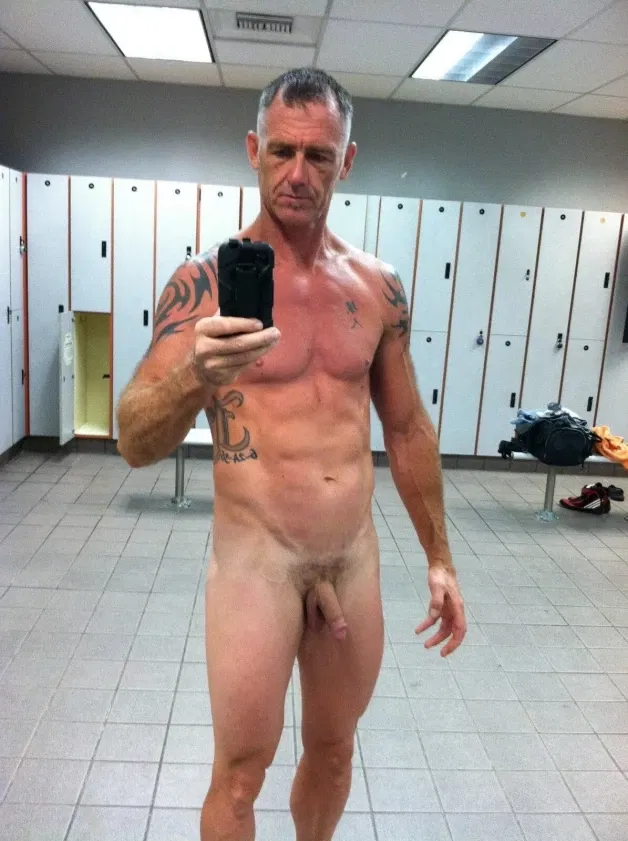 Photo by Nickplus33 with the username @Nickplus33, who is a verified user,  May 13, 2024 at 5:05 AM and the text says '#selfie #toned #daddy #ink #trimmed  #lockerroom #granddaddy'