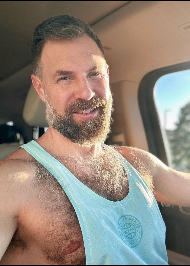 Photo by Nickplus33 with the username @Nickplus33, who is a verified user,  July 3, 2024 at 2:04 AM and the text says '#car #daddy #beard #hairy'