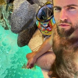 Photo by Nickplus33 with the username @Nickplus33, who is a verified user,  May 6, 2024 at 4:10 AM and the text says '#pool #daddy #hairy #bear #thickbush #beard #outdoors'