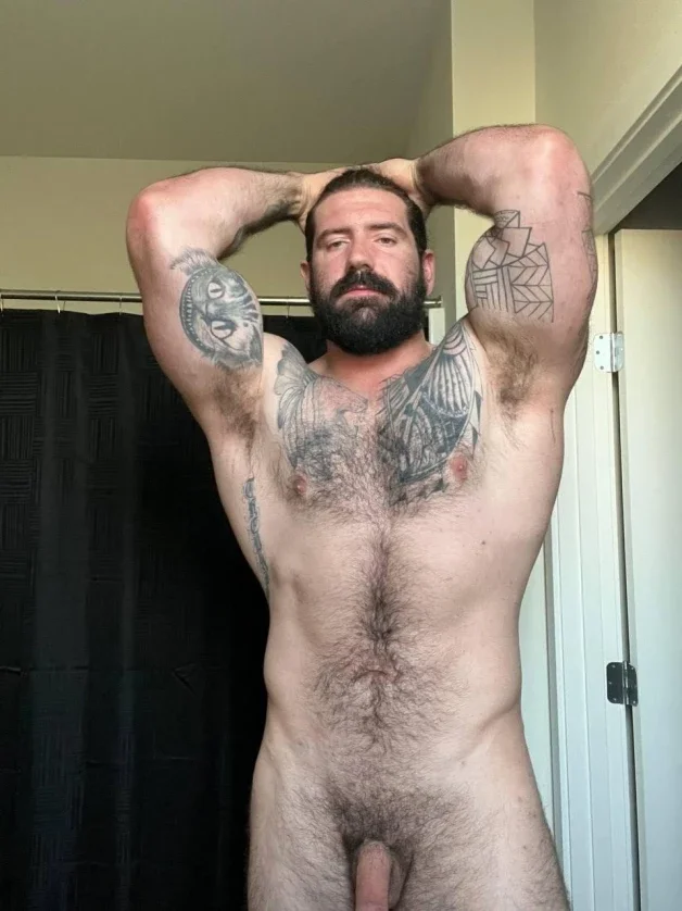 Photo by Nickplus33 with the username @Nickplus33, who is a verified user,  April 13, 2024 at 3:14 AM and the text says '#beard #ink #beard #beefy #trimmed'
