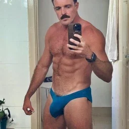 Photo by Nickplus33 with the username @Nickplus33, who is a verified user,  May 12, 2024 at 3:55 AM and the text says '#selfie #daddy #toned #hairy #bulge #stache #hairychest'