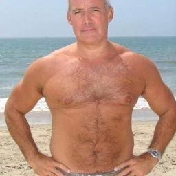 Photo by Nickplus33 with the username @Nickplus33, who is a verified user,  May 8, 2024 at 5:25 AM and the text says '#beefy #hairy #beach #outdoors #daddy #hairychest'