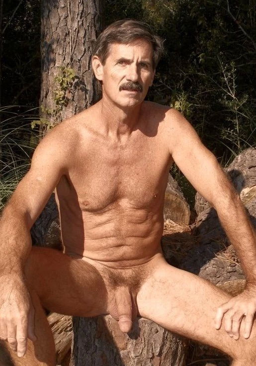 Photo by Nickplus33 with the username @Nickplus33, who is a verified user,  May 2, 2024 at 3:25 AM and the text says '#daddy #stache #outdoors #cruising #hung #manspread'