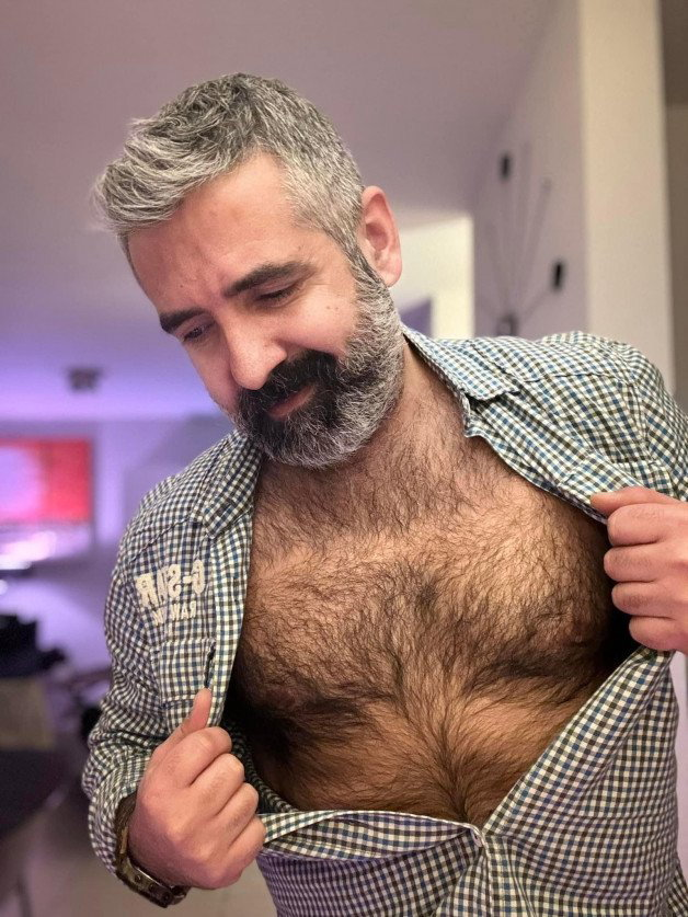 Photo by Nickplus33 with the username @Nickplus33, who is a verified user,  April 26, 2024 at 1:47 AM and the text says '#daddy #beard #beefy #hairy'