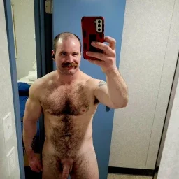 Photo by Nickplus33 with the username @Nickplus33, who is a verified user,  April 2, 2024 at 3:45 AM and the text says '#dilf #dimple #selfie #hairy #bald #stache #toned #longdick #hung'