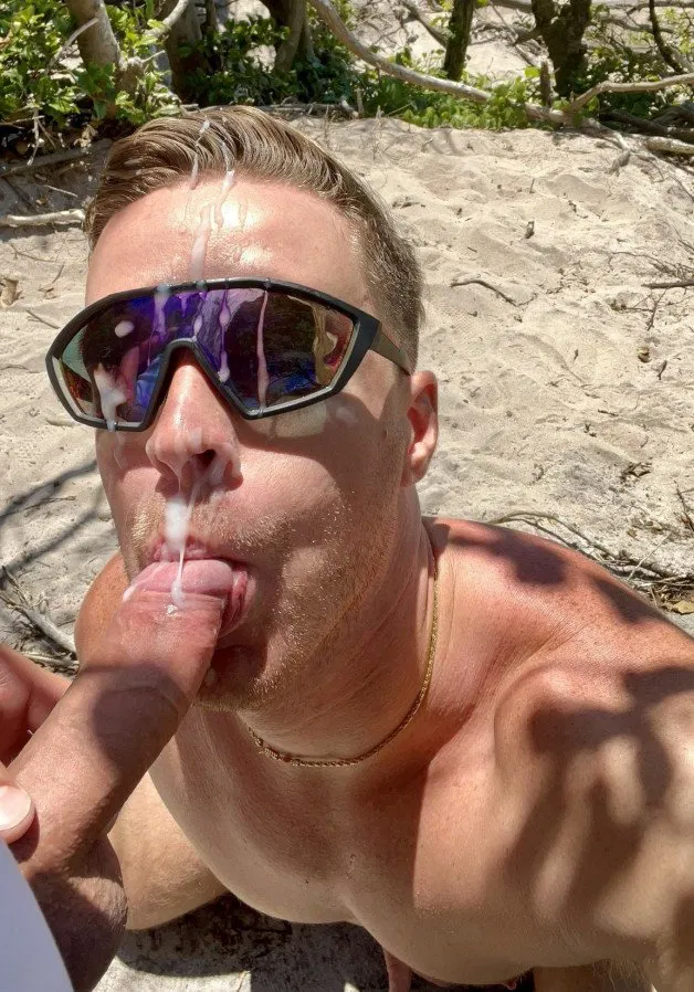 Photo by Nickplus33 with the username @Nickplus33, who is a verified user,  June 10, 2024 at 1:44 AM and the text says '#blondes #cumfacial #shades #chain #outdoorcruising #cocksucking #BJ'