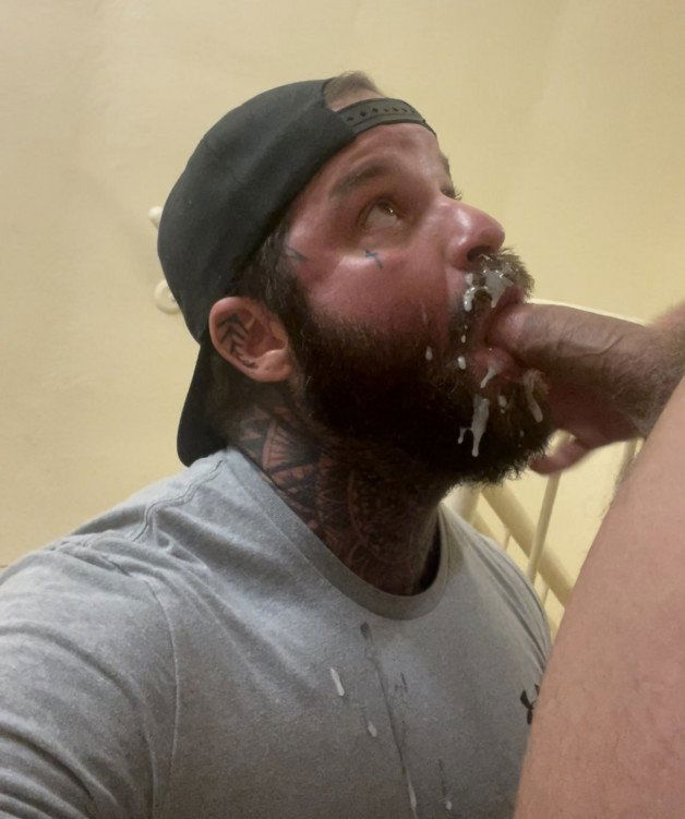 Photo by Nickplus33 with the username @Nickplus33, who is a verified user,  July 4, 2024 at 2:59 AM and the text says '#caps #beard #ink #cummybeard #cocksucking #BJ #cumfacial #dilf #Durden #obsession'