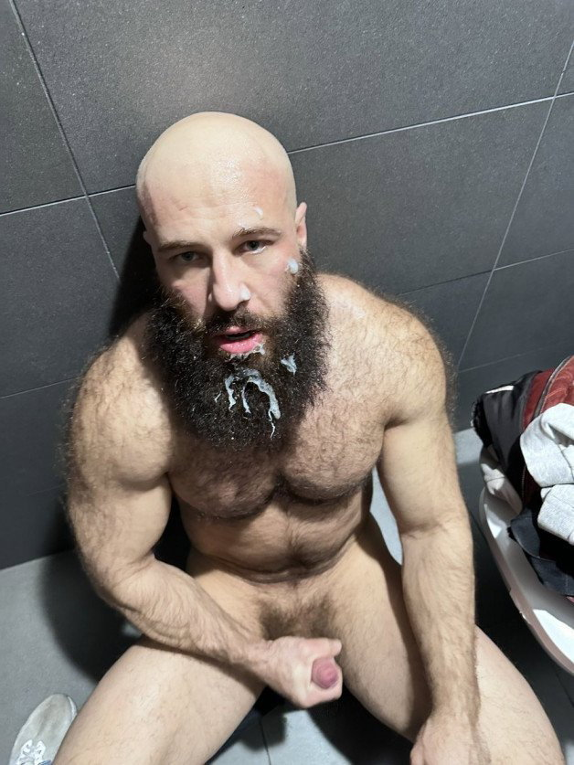 Photo by Nickplus33 with the username @Nickplus33, who is a verified user,  April 19, 2024 at 1:46 AM and the text says '#dilf #toned #hairy #beard #bald #bush #cumfacial #cummybeard #cum'
