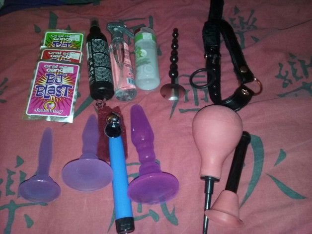 Photo by Lipsy70 with the username @Lipsy70,  June 15, 2016 at 1:31 PM and the text says 'Someone got a little spoilt tonight!!!

From top right across: bj blast oral popping candy, getmaxxx silicon lube, Swiss you cleaner, h2o green apple lube, anal beads, open mouth gag, purple butt plugs that step in size for training, stainless steel with..'