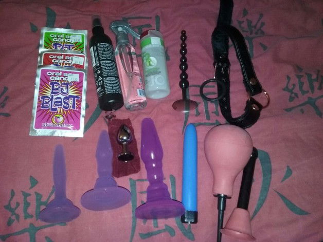 Photo by Lipsy70 with the username @Lipsy70, posted on June 15, 2016 and the text says 'Someone got a little spoilt tonight!!!

From top right across: bj blast oral popping candy, getmaxxx silicon lube, Swiss you cleaner, h2o green apple lube, anal beads, open mouth gag, purple butt plugs that step in size for training, stainless steel with...'