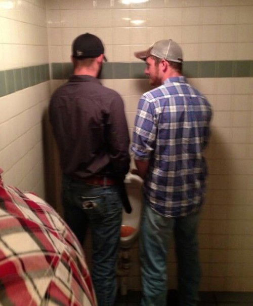 Photo by BuddyBate with the username @BuddyBate,  August 30, 2016 at 5:35 PM and the text says 'I love this pic so much. At first you think it’s just a couple of buddies sharing a urinal out of necessity, then you realize that the guy on the right has a big hard cock reaching out in front of him. I love urinal wank sessions with new guys!Follow:..'