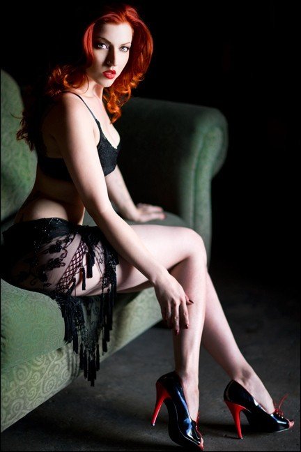 Photo by Arousal with the username @Arousal,  December 1, 2010 at 7:58 PM and the text says 'smirkindfw:

I’m in love with red…
 #Redhead  #Sultry'