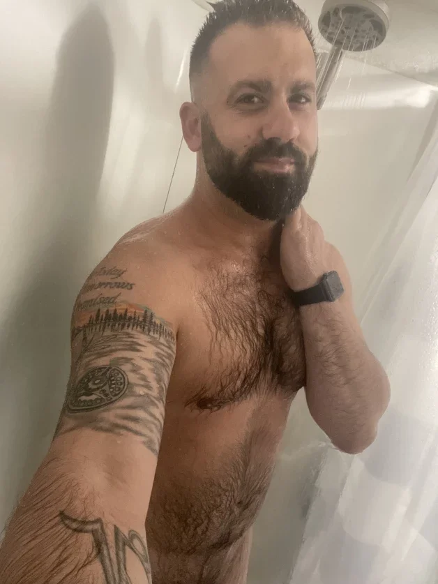 Photo by Bearded-dadbod with the username @Beardeddad22, who is a verified user,  March 21, 2024 at 3:28 AM and the text says 'love the shower! Dont you?

#shower #dadbod #hairy #horny #beard #straight #bi #gay #trans'