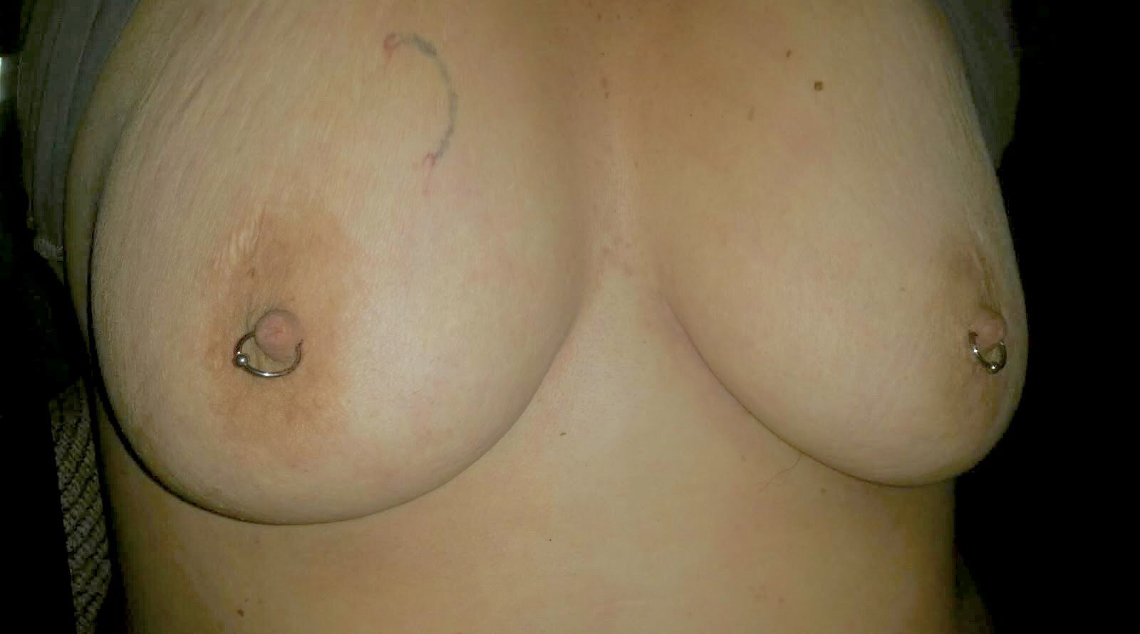 Photo by Shuttermaster021 with the username @Shuttermaster021, who is a verified user,  March 11, 2019 at 8:19 PM. The post is about the topic Piercing and the text says 'My sub wanted to prove her commitment to me so for her birthday I paid for her nipples to be pierced. Once they are healed, I’m going to have lots of fun with these rings 😈'