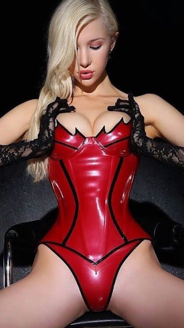 Photo by LatexAngel with the username @LatexAngel, who is a star user,  June 2, 2015 at 5:01 PM and the text says 'She can&rsquo;t squeeze them by herself. Will you lend a helping hand? :) #RedLatex #fetish #blonde #babe:'