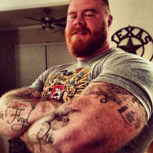 Photo by Cheftu with the username @Cheftu, who is a verified user,  January 23, 2014 at 11:03 AM and the text says 'bearweek365:

Those ARMS tho… #beefyboys #bearweek365 #ink #tattoos'