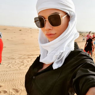 Album by SereneSophie with the username @SereneSophie, who is a star user,  May 3, 2019 at 11:36 AM and the text says '#DubaiDiaries #SereneSophie #DubaiLife

I'm wandering through the desert🏜🌞... the thirst for🔭exploration never stops🎒👠💎 until I'll find my💗oasis of happiness💋

#FridayFeeling 🔛 #MyStory @ http://bit.ly/SereneSophie 🔥🔥🔥'