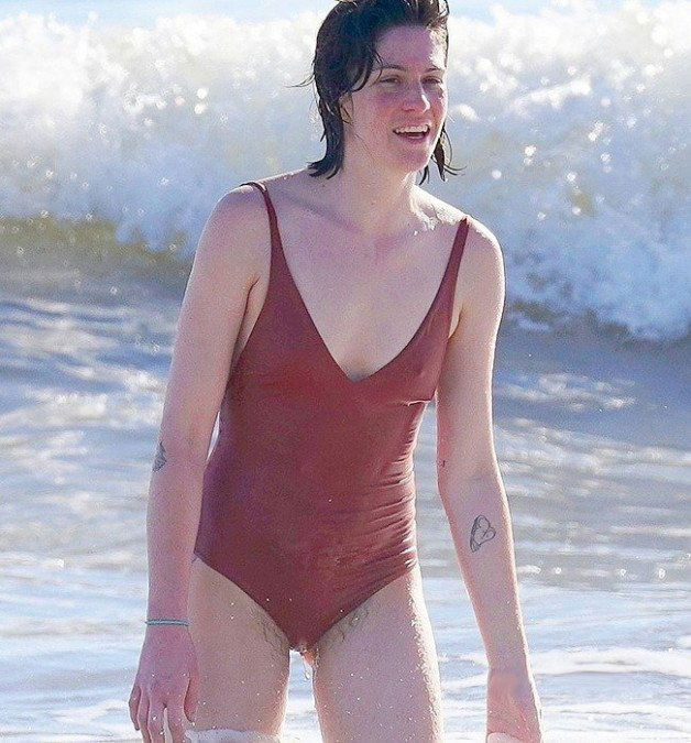 Photo by BushHunter13 with the username @BushHunter13,  August 22, 2022 at 5:50 PM. The post is about the topic Nude Celebrity and the text says 'Charlotte Simpson can't contain her bush at the beach!'